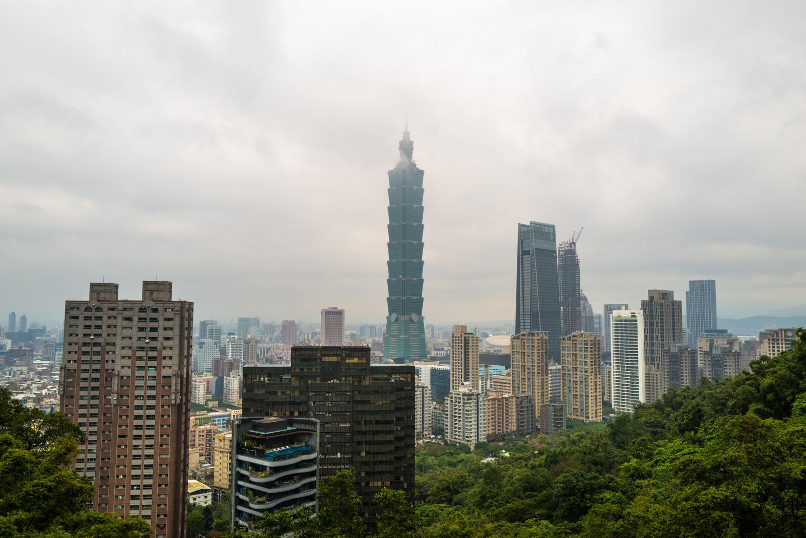 Taipei 101 and the green Taipei basin in daylight