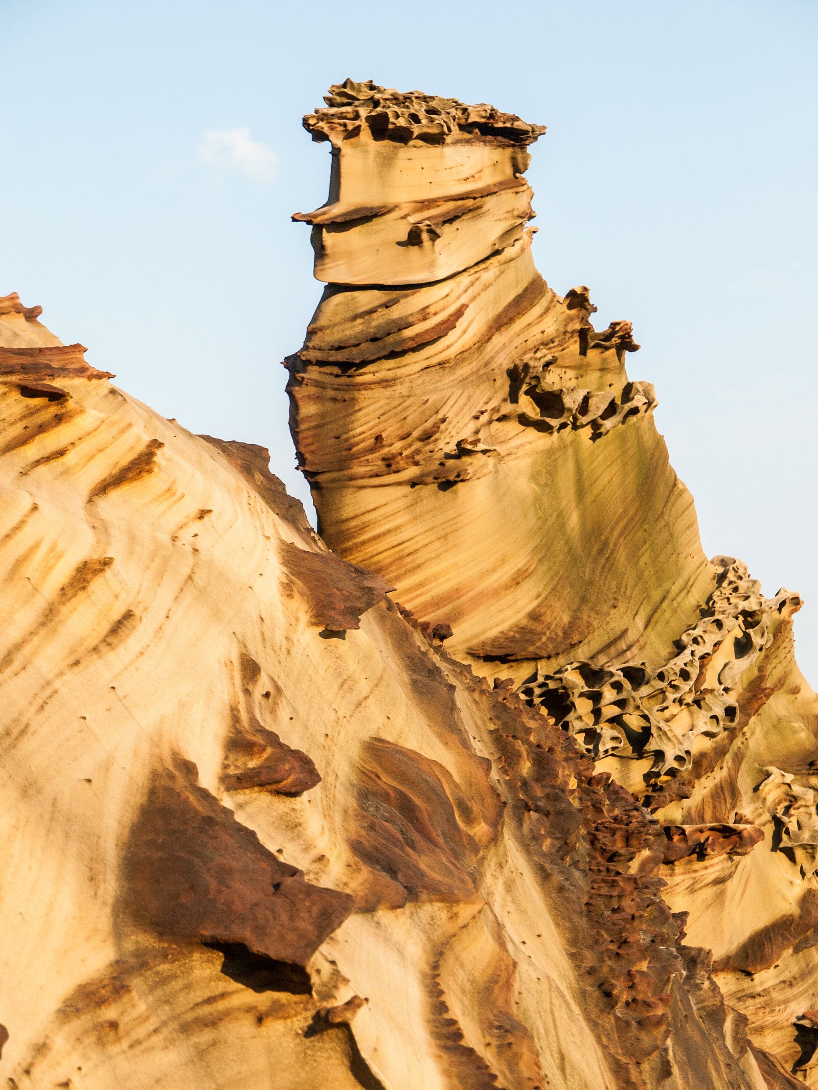 Sculpted golden rock at Yehliu Geopark