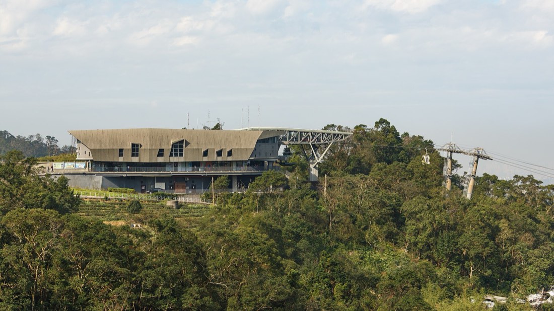 Maokong Gondola cabins crossing forested hills above Taipei